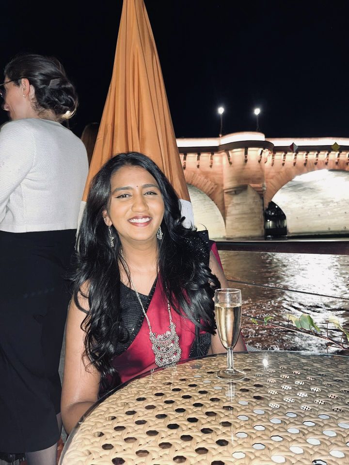 Yashumithaa on the Seine at night, Paris